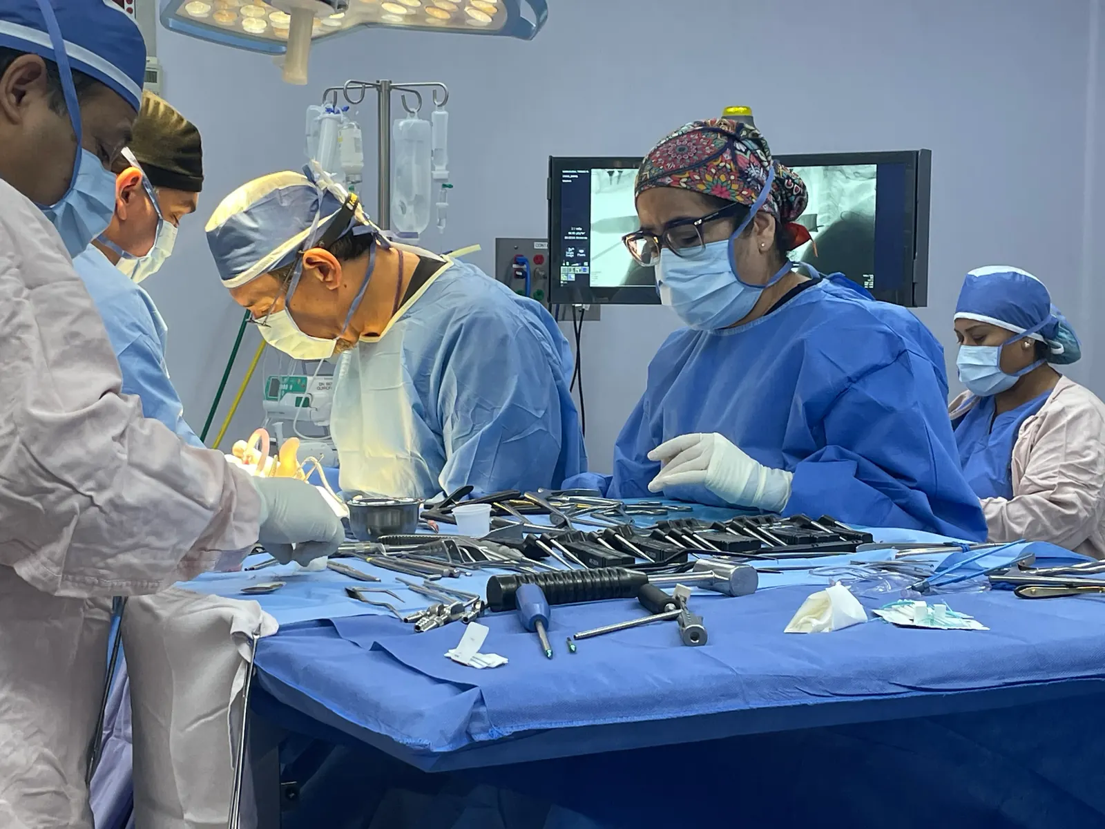 Dr. Carrillo operating with his team
